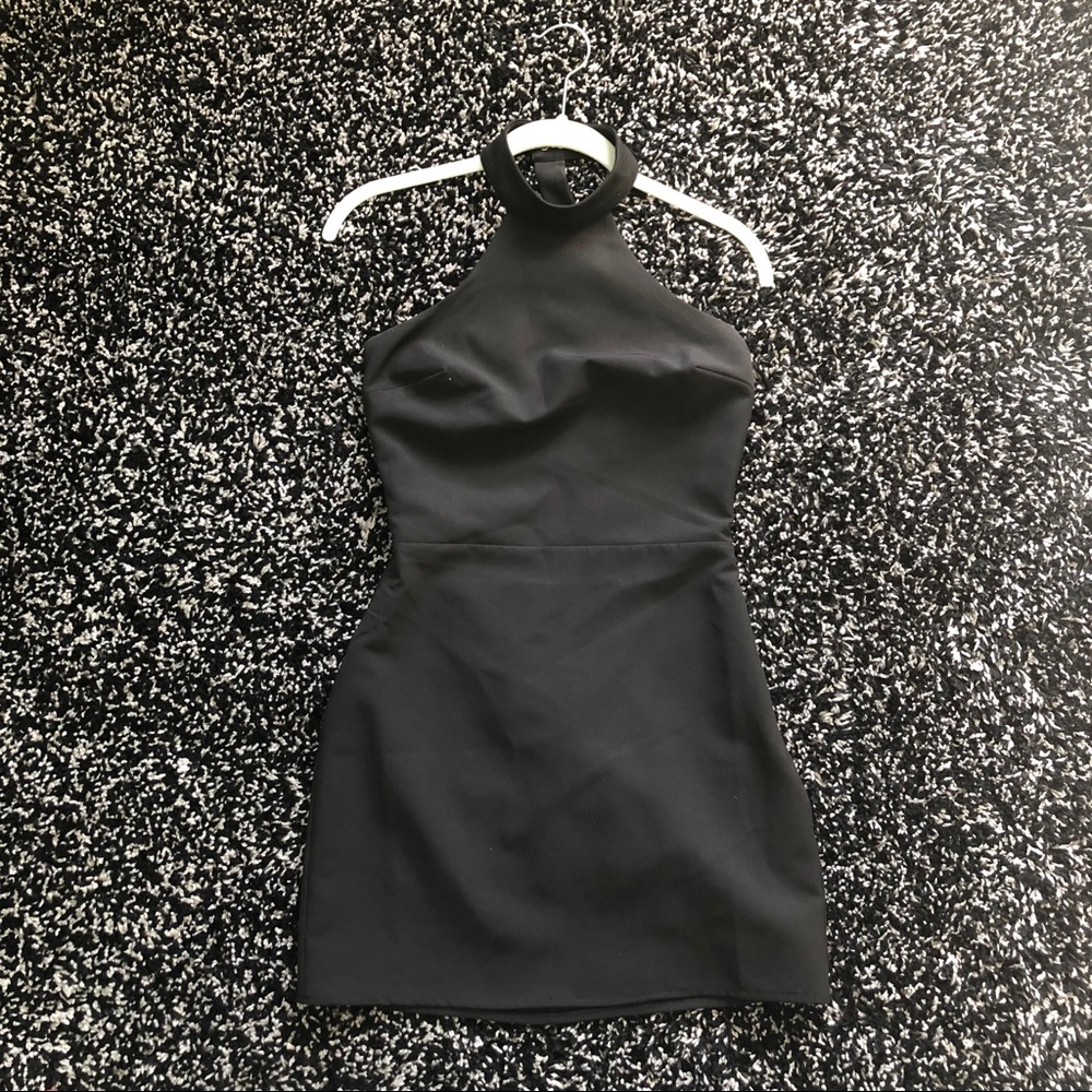 Bodycon black dress with open back